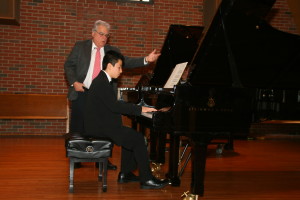Eric Wang performs for Joseph Kalichstein at the NJMTA conference advanced master class